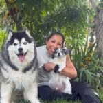 Hope with her dogs Misha and Oreo